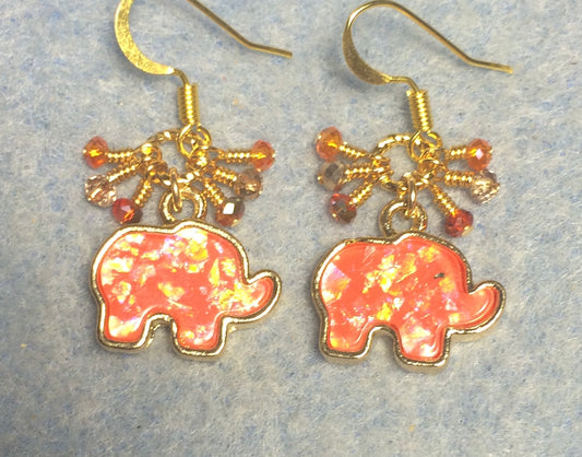 Orange pink imitation opal elephant charm earrings adorned with tiny dangling orange and gold Chinese crystal beads.