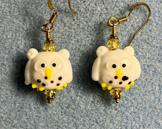 White and yellow lamp work spotted owl bead earrings adorned with yellow Czech glass beads.