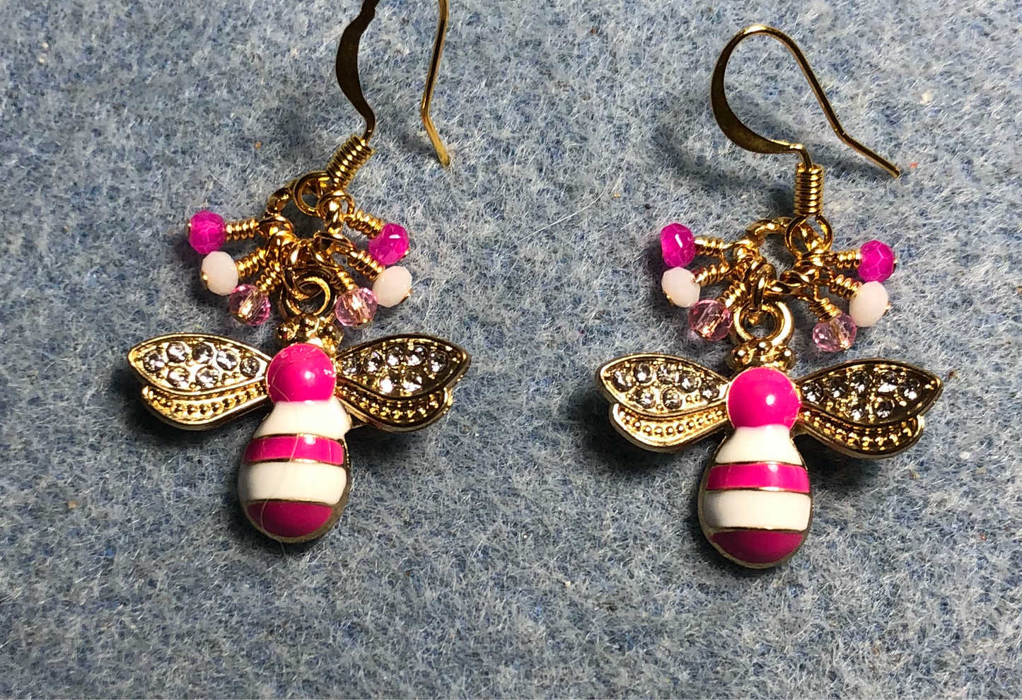 Hot pink and white enamel and rhinestone striped honeybee charm earrings adorned with tiny dangling hot pink and light pink Chinese crystal beads.