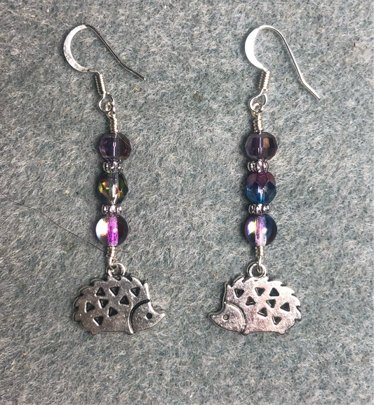 Silver porcupine charm earrings adorned with sparkly purple Czech glass beads