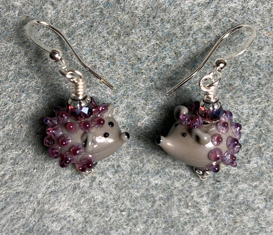 Small gray and purple lamp work hedgehog bead earrings adorned with purple Chinese crystal beads.