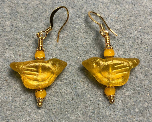 Lemon yellow Czech glass bird bead earrings adorned with lemon yellow Chinese crystal beads.