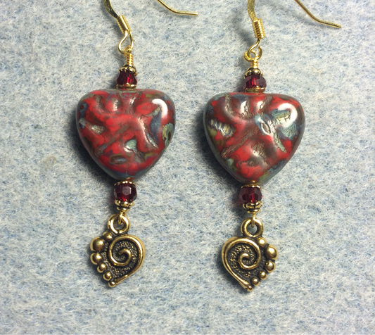 Red Picasso Czech glass heart bead earrings made with red Chinese crystal beads and gold Tierracast spiral heart charms.