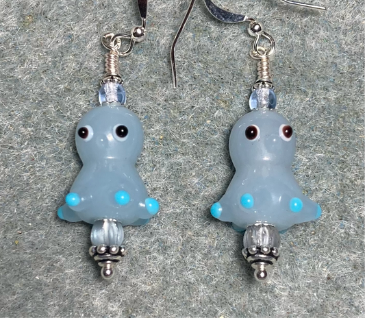 Light blue lamp work octopus bead earrings adorned with light blue Czech glass beads.