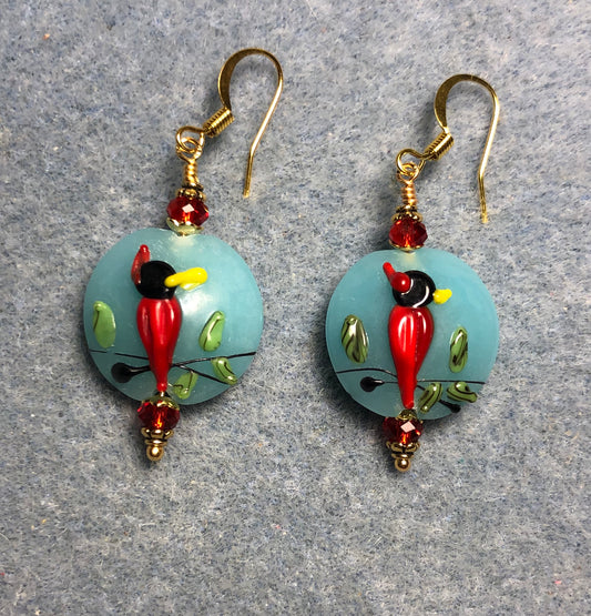 Red lamp work cardinal bead earrings adorned with red Chinese crystal beads.