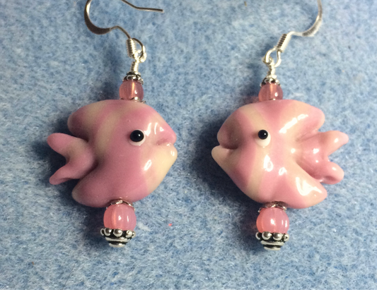 Dark pink and light pink lamp work striped angelfish bead earrings adorned with pink Czech glass beads.