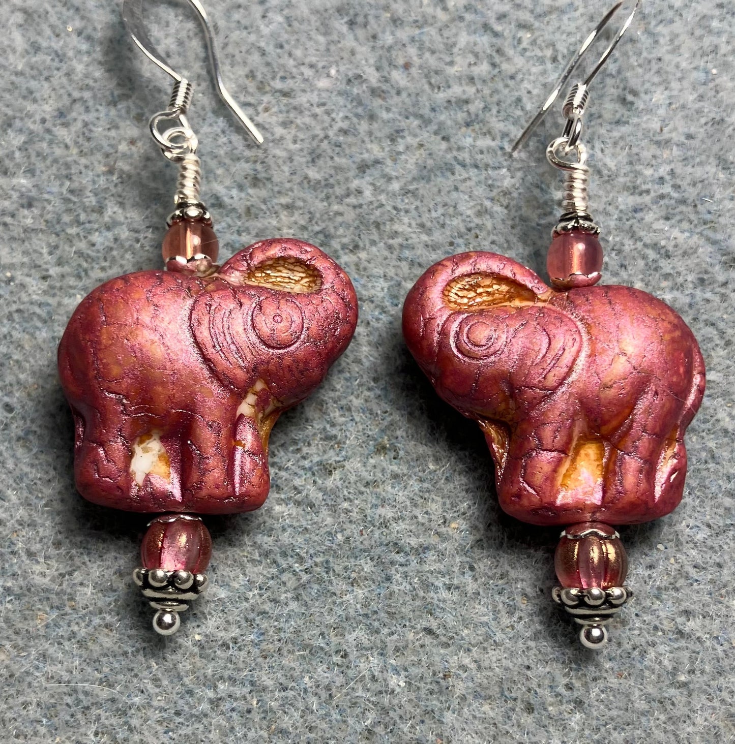 Rose pink Czech glass elephant bead earrings adorned with rose pink Czech glass beads.