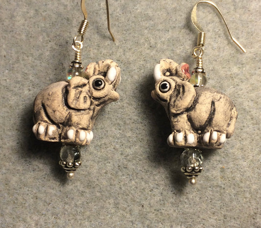 Gray and white ceramic elephant bead earrings adorned with clear Czech glass beads.