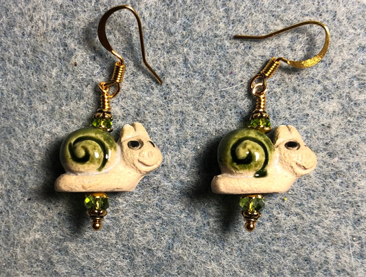 Small olive green ceramic snail bead earrings adorned with olive green Chinese crystal beads.