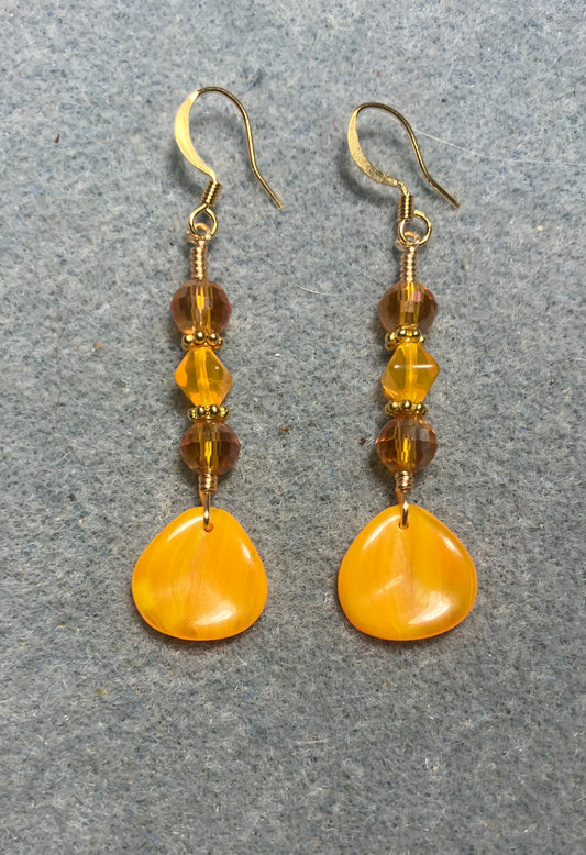 Tangerine Czech glass rose petal earrings adorned with tangerine and orange Czech glass beads.