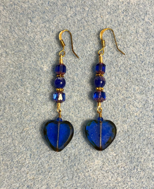 Translucent dark blue Czech glass heart bead earrings adorned with dark blue Czech glass beads.