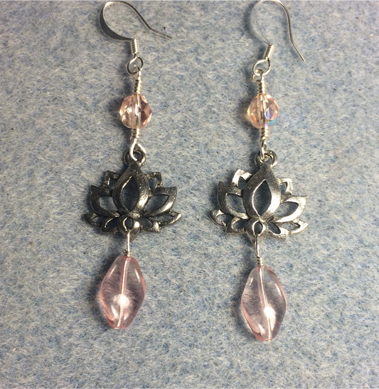 Silver lotus flower connector charm earrings adorned with pink Czech glass twist beads and pink Czech glass beads.