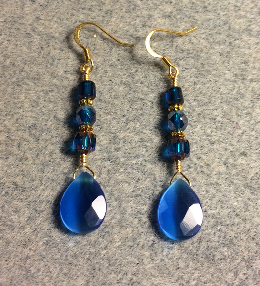 Turquoise blue fiber optic briolette bead earrings adorned with turquoise blue Czech glass beads.