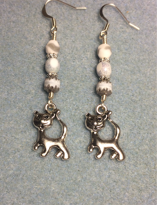 Silver cat charm earrings adorned with gray and white Czech glass beads