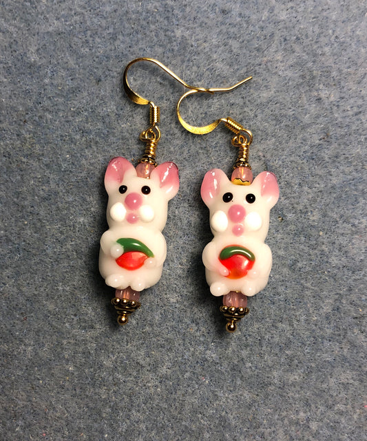 White and pink lamp work bunny rabbit bead earrings adorned with pink Czech glass beads.