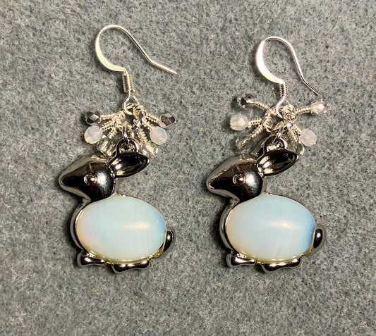 Large silver and opalite gemstone rabbit charm earrings adorned with small dangling white, silver, and clear Czech glass beads.