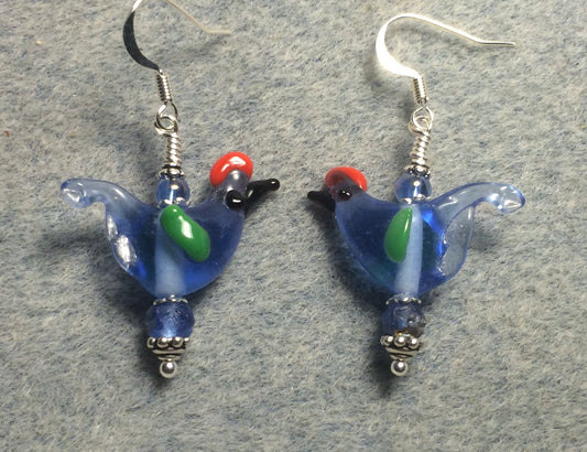 Translucent light blue red crested lamp work songbird bead earrings adorned with light blue Czech glass beads.