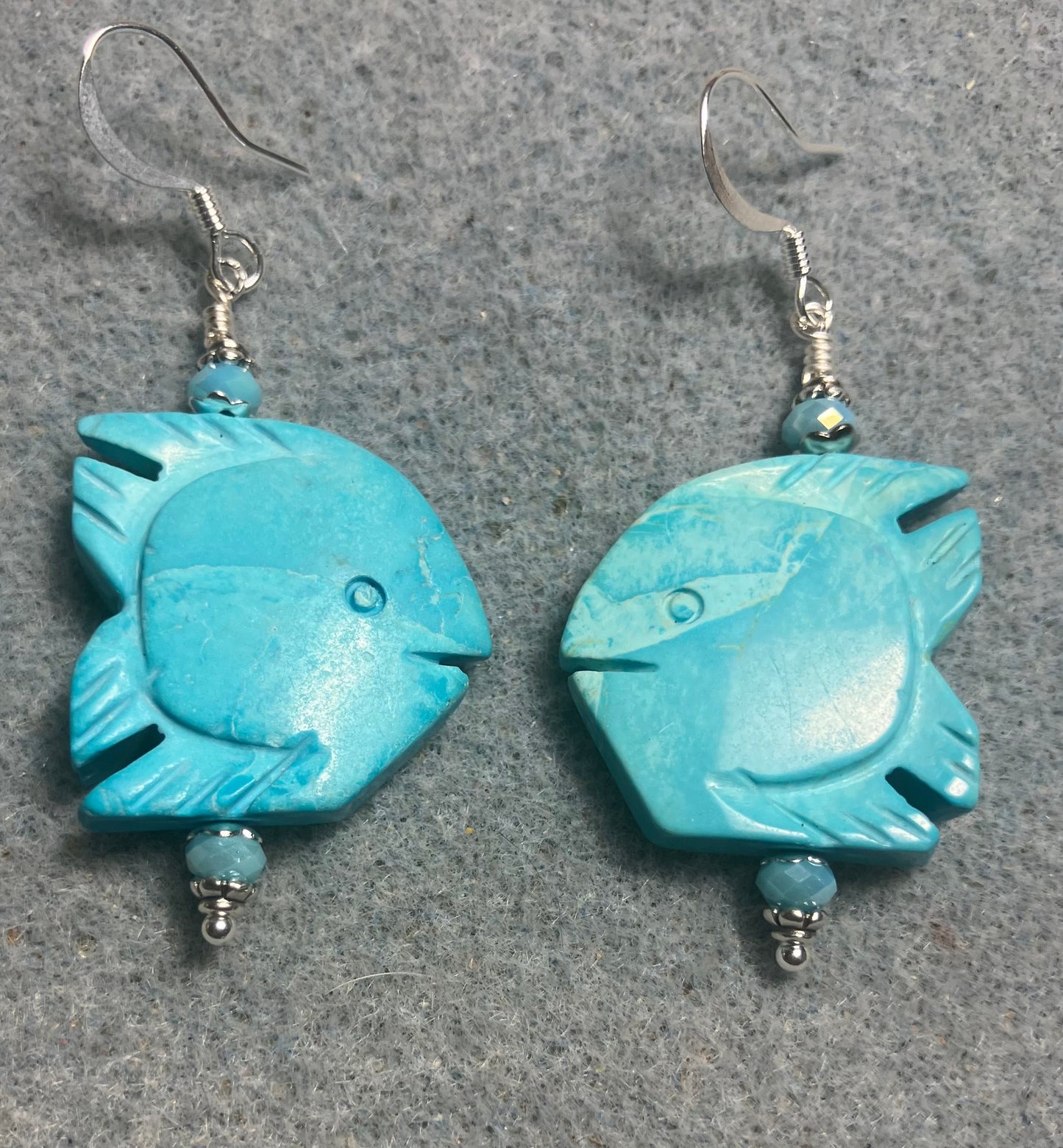 Large turquoise gemstone angelfish bead earrings adorned with turquoise Chinese crystal beads.