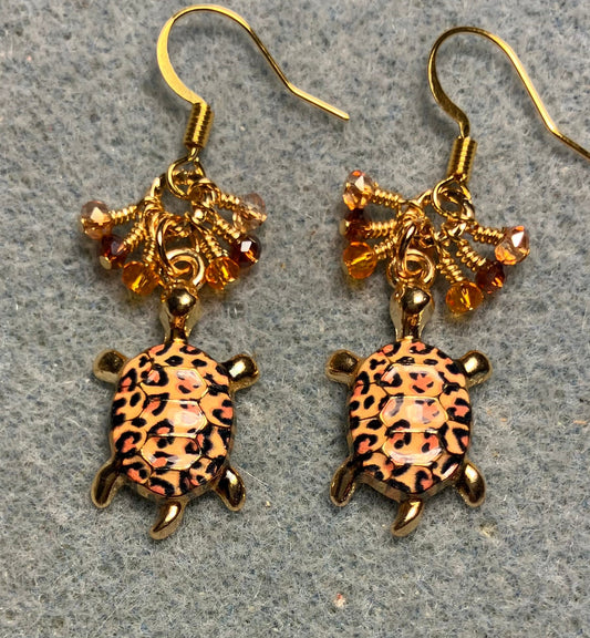 Orange, brown, and amber enamel turtle charm earrings adorned with tiny dangling orange, brown, and amber Chinese crystal beads.