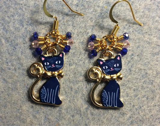 Dark blue and pink enamel cat charm earrings adorned with small dangling dark blue and pink Chinese crystal beads.