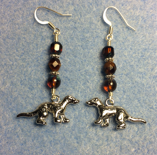 Silver otter charm earrings adorned with brown Czech glass beads