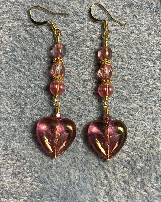 Sparkly pinkish gold Czech glass heart bead earrings adorned with pinkish gold Czech glass beads.