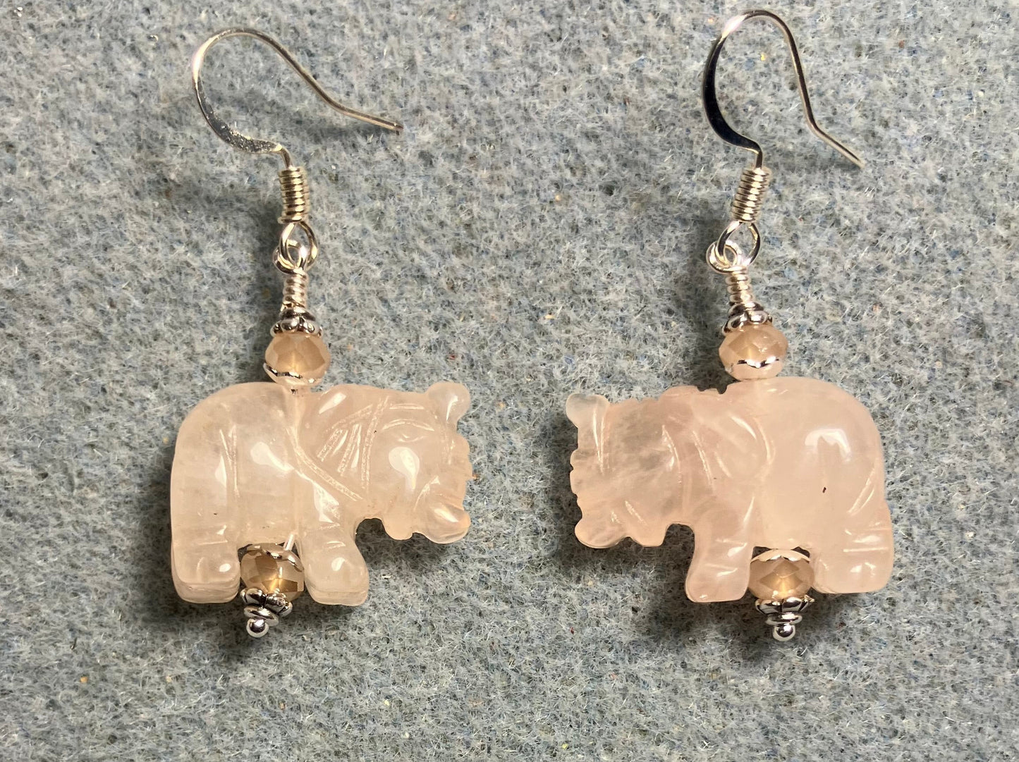 Pink rose quartz gemstone elephant bead earrings adorned with peach Chinese crystal beads.