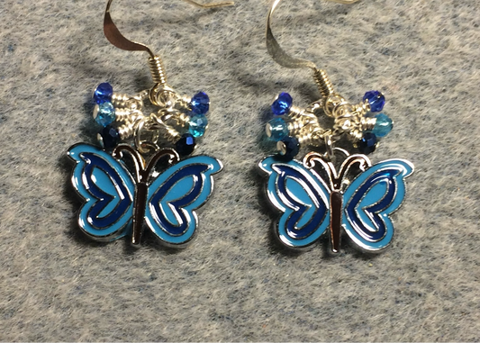 Turquoise and blue enamel butterfly charm earrings adorned with tiny dangling turquoise and blue Chinese crystal beads.