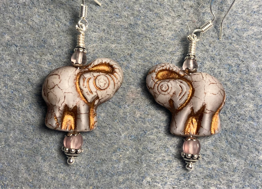 Light violet (with copper inlay) Czech glass elephant bead earrings adorned with light violet Czech glass beads.