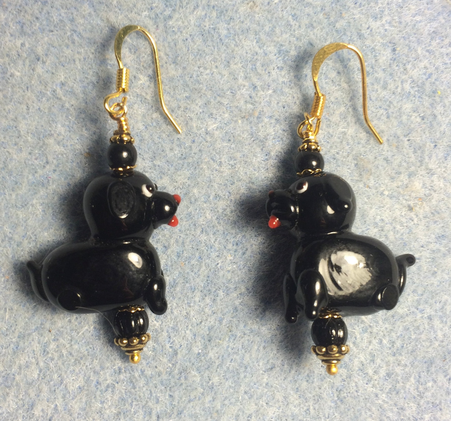 Black lamp work puppy dog bead earrings adorned with black Czech glass beads.