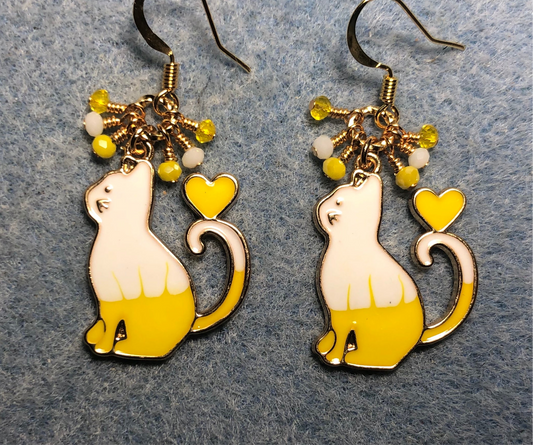 Yellow and white enamel cat charm earrings adorned with tiny dangling yellow and white Chinese crystal beads.