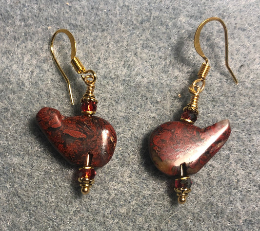 Small red brecciated jasper gemstone whale bead earrings adorned with dark red Chinese crystal beads.