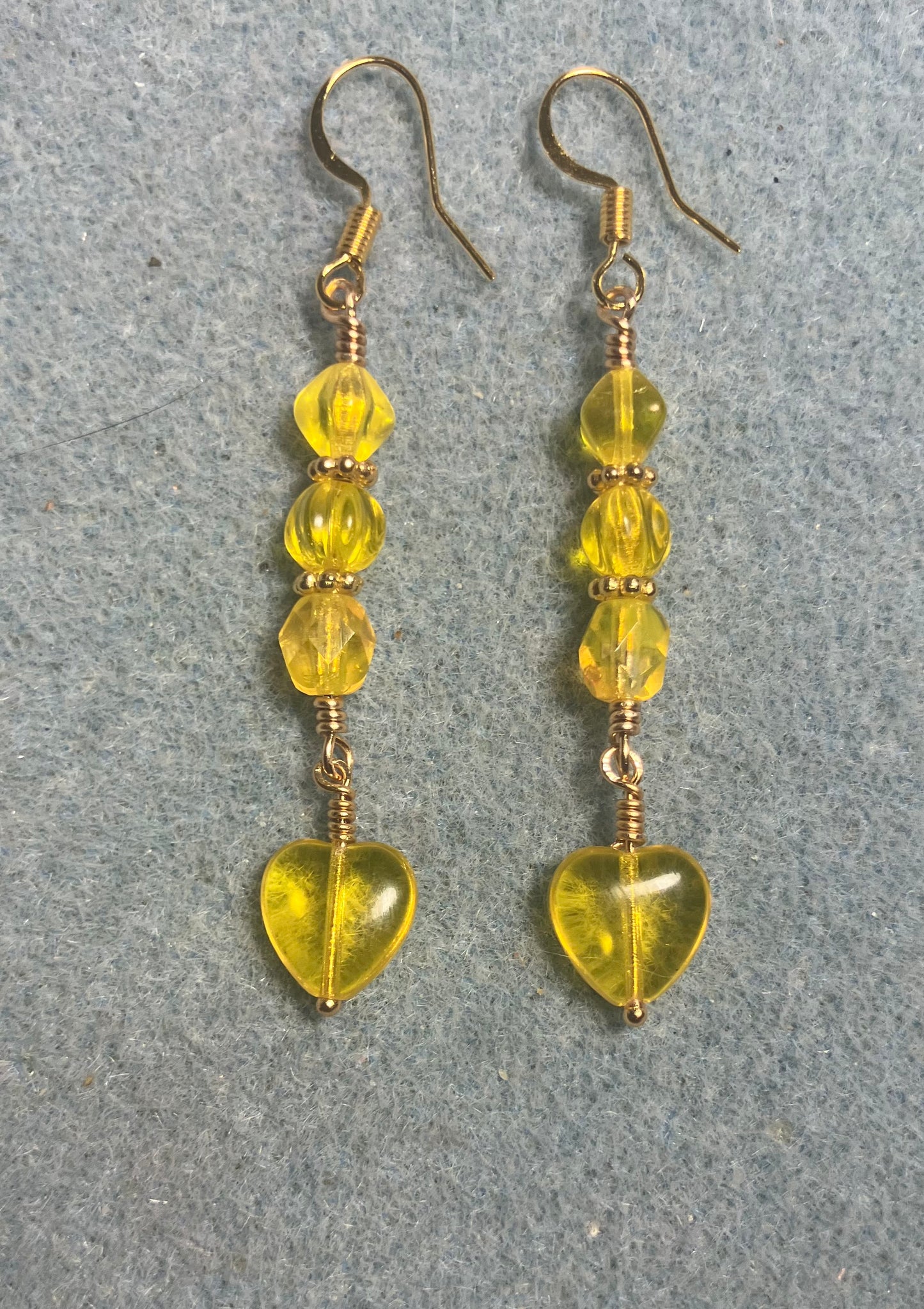 Small lemon yellow Czech glass heart bead earrings adorned with lemon yellow Czech glass beads.
