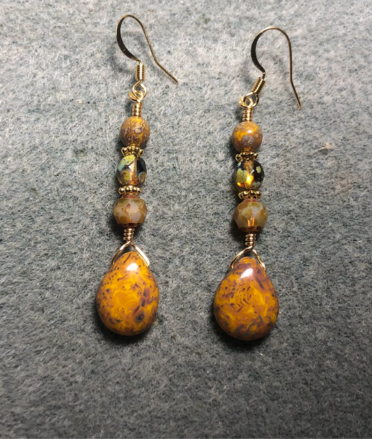 Gold Picasso Czech glass pear drop bead earrings adorned with gold Picasso Czech glass beads.