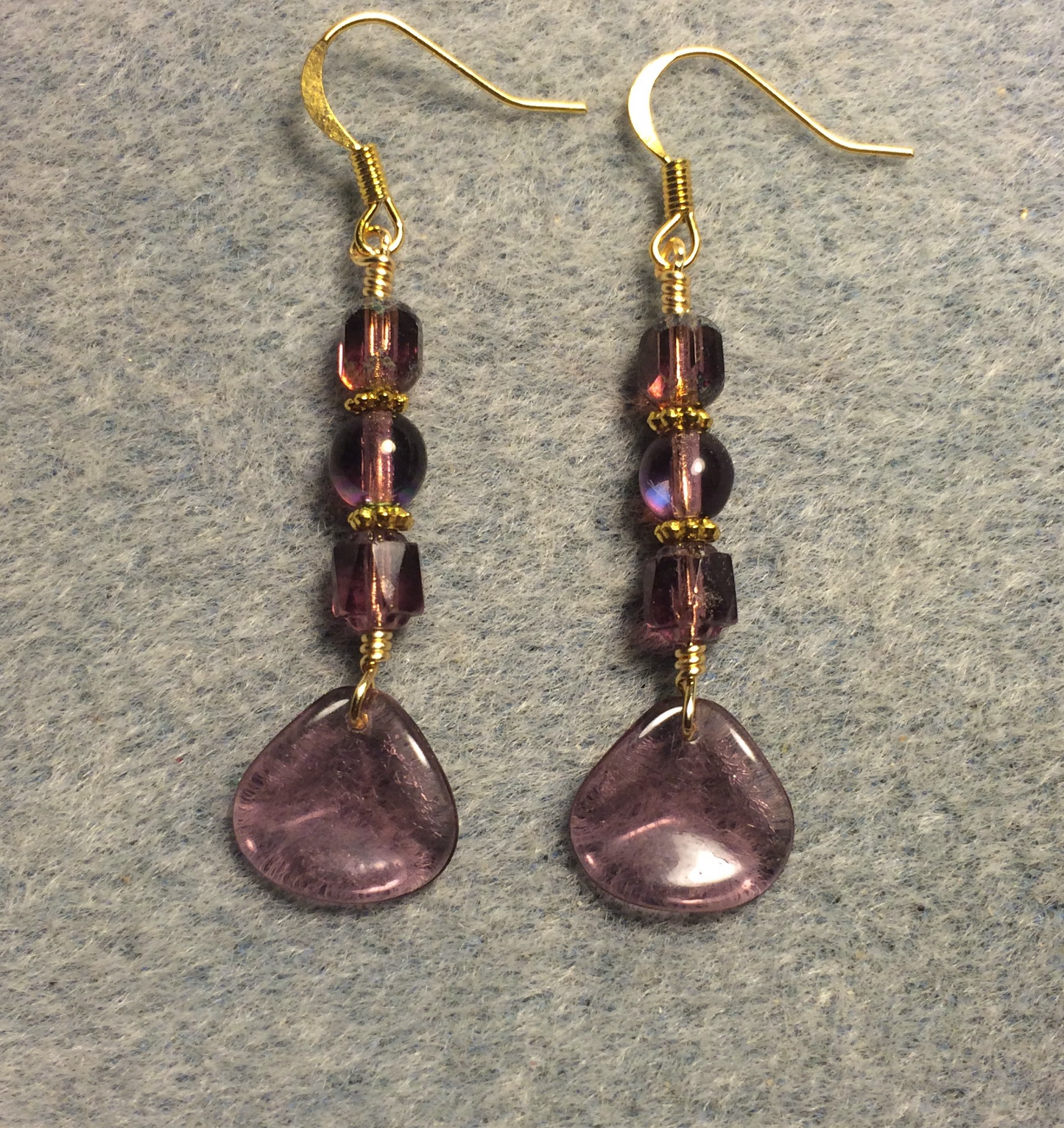 Translucent violet Czech glass rose petal earrings adorned with violet Czech glass beads.