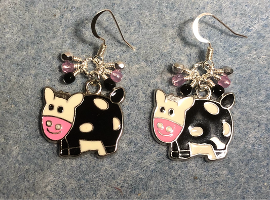 Black, white, and pink enamel pig charm earrings adorned with tiny dangling black, pink, and silver Czech glass beads.