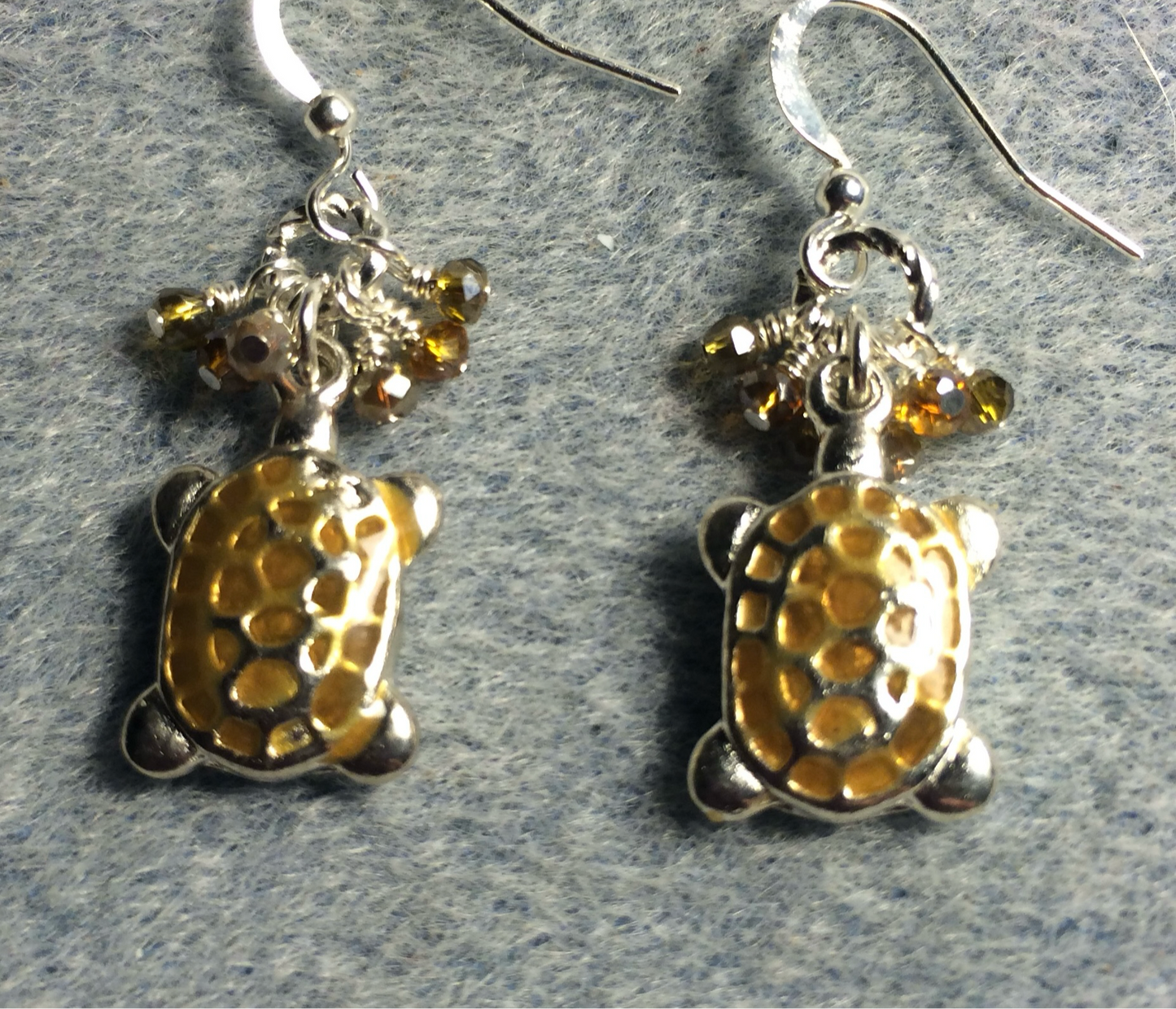 Silver and topaz enamel turtle charm earrings adorned with tiny dangling topaz Chinese crystal beads.