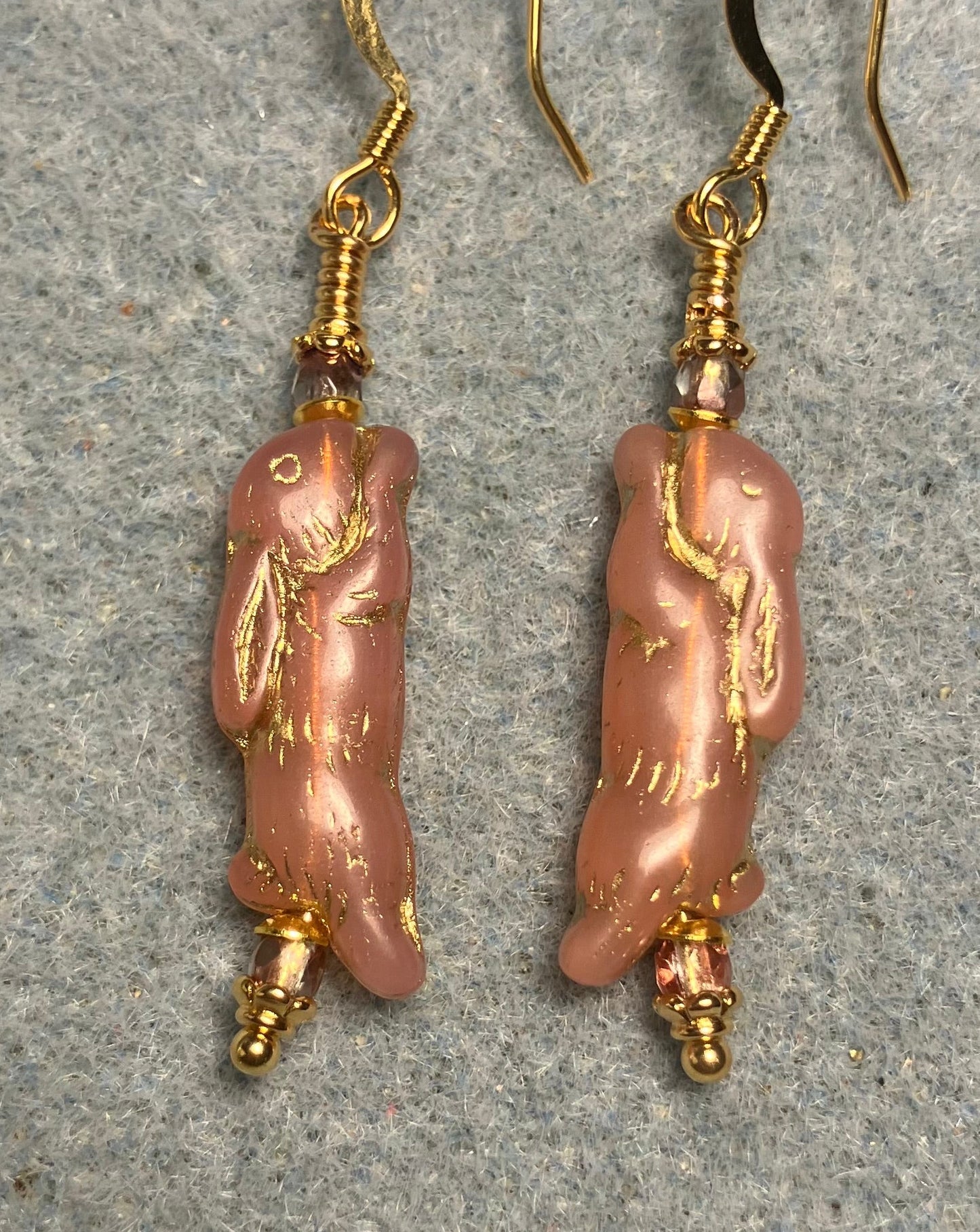 Small rose pink (with gold inlay) Czech glass bunny rabbit bead earrings adorned with small rose pink Czech glass beads.