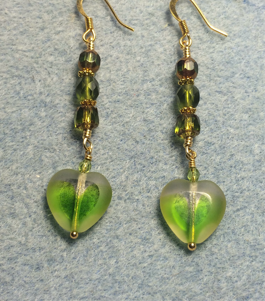 Olive green Czech glass heart bead earrings adorned with olive green Czech glass beads.