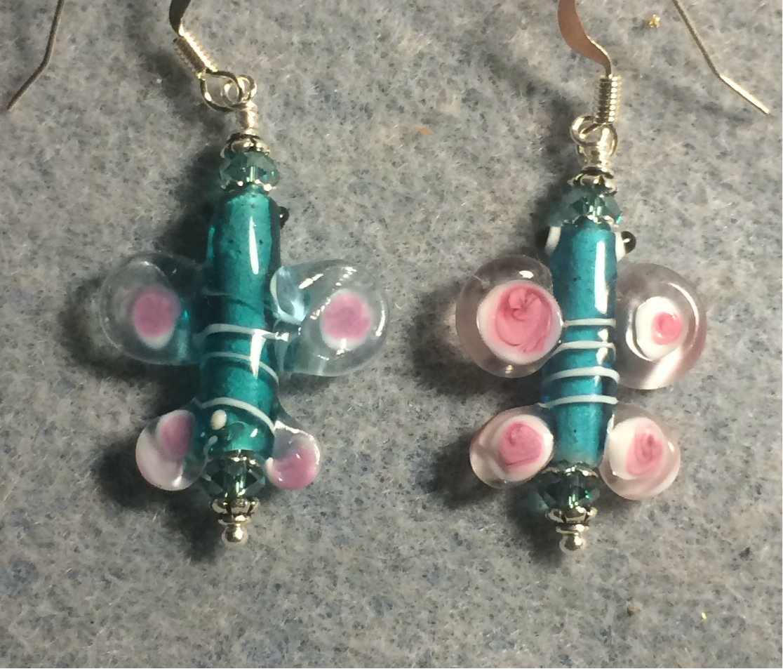 Teal and pink lamp work butterfly bead earrings adorned with teal Chinese crystal beads.