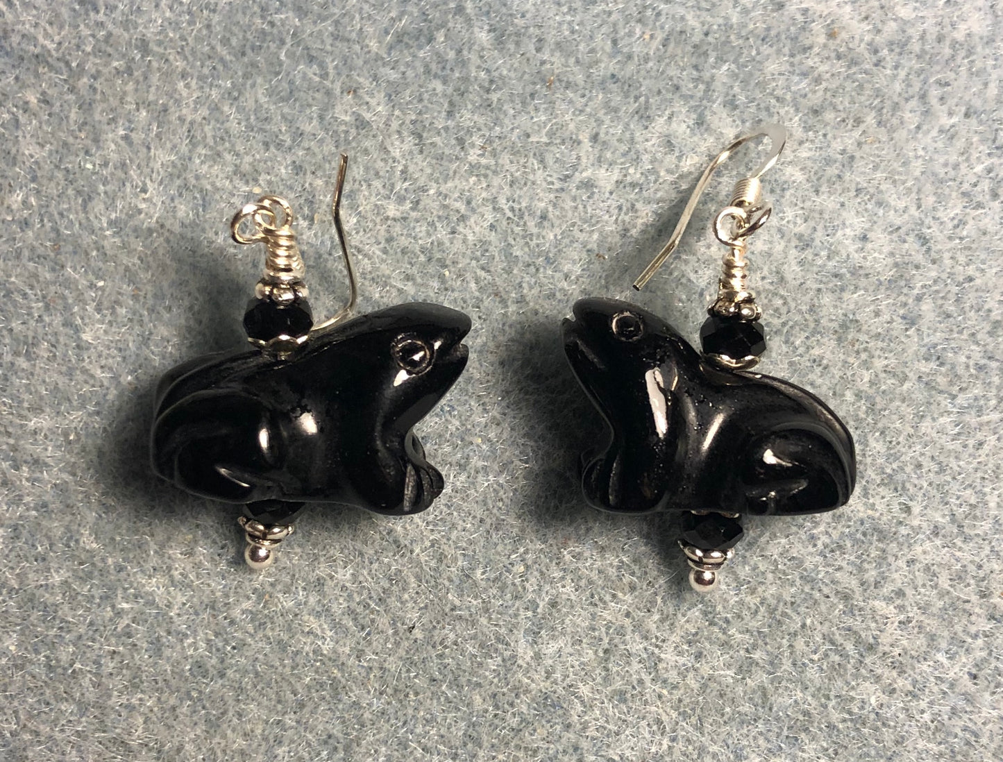 Vintage carved black onyx frog bead earrings adorned with black Chinese crystal beads.