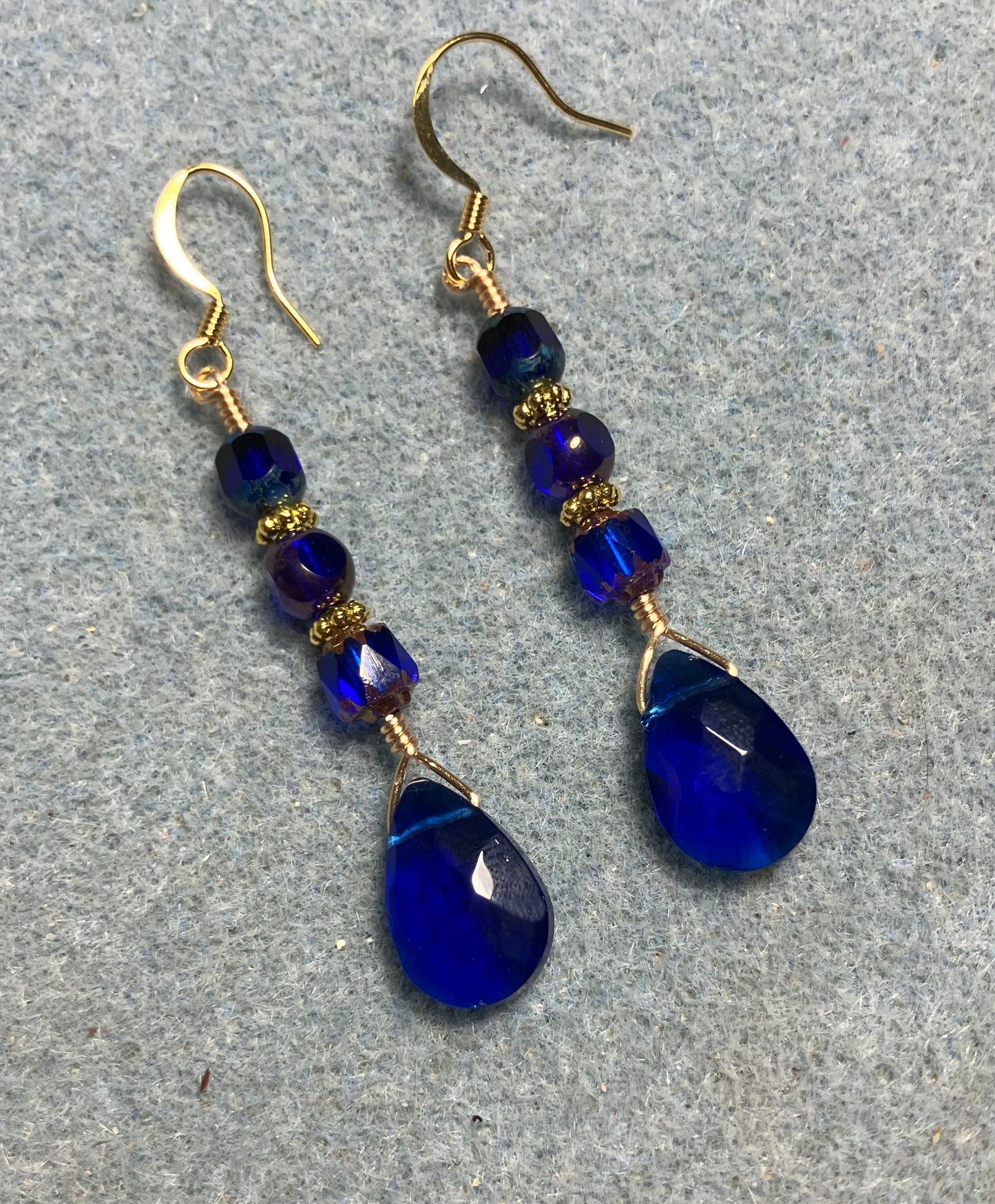 Cobalt blue Czech glass briolette bead earrings adorned with cobalt blue Czech glass beads.
