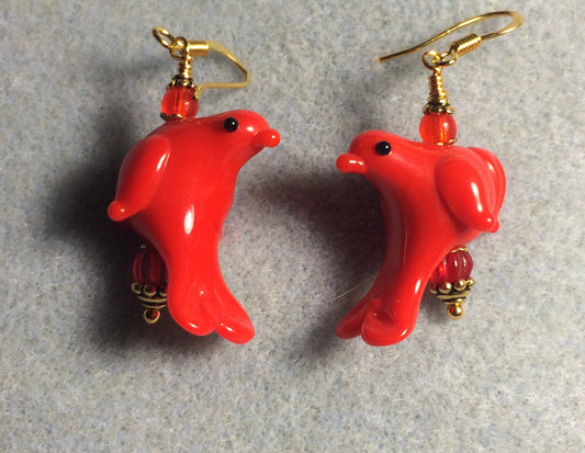 Opaque bright red lamp work songbird bead earrings adorned with red Czech glass beads.