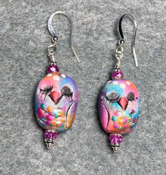 Pink, violet, and turquoise polymer clay owl bead earrings adorned with hot pink Chinese crystal beads.