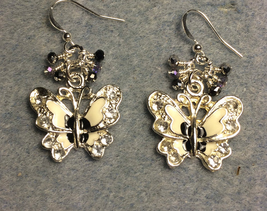 Silver, white, and black enamel and rhinestone butterfly charm earrings adorned with tiny dangling black and silver Chinese crystal beads.