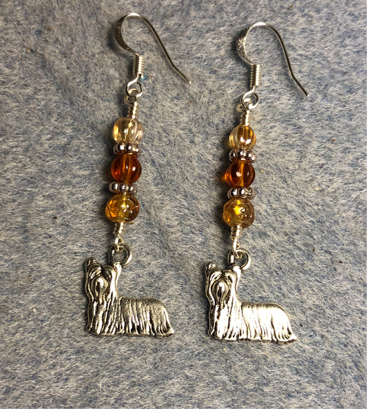 Small silver Yorkshire Terrier charm earrings adorned with small amber Czech glass beads