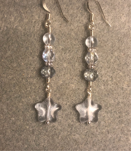 Small light blue Czech glass star bead earrings adorned with light blue Czech glass beads.