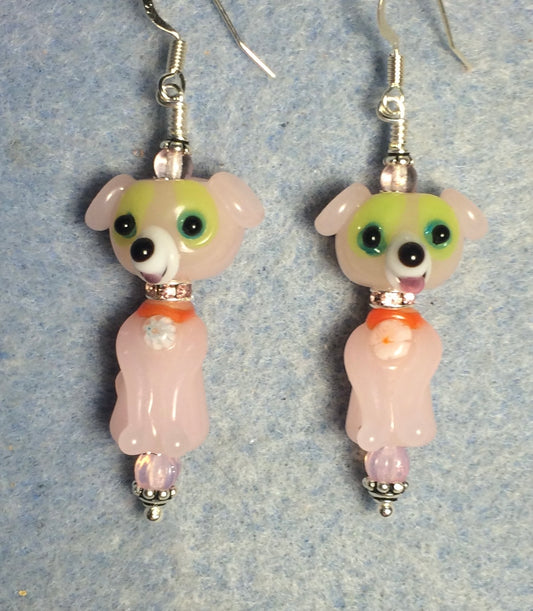 Pink lamp work dog bead earrings adorned with pink rhinestone rondelle “collars” and pink Czech glass beads.