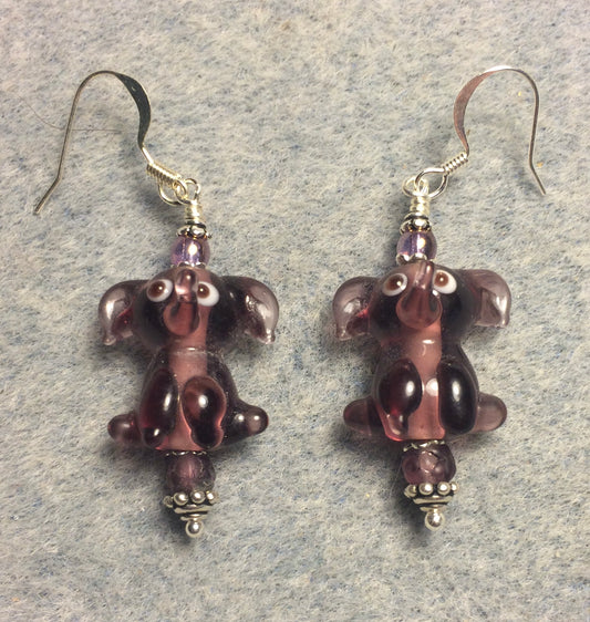 Translucent violet lamp work sitting elephant bead earrings adorned with violet Czech glass beads.