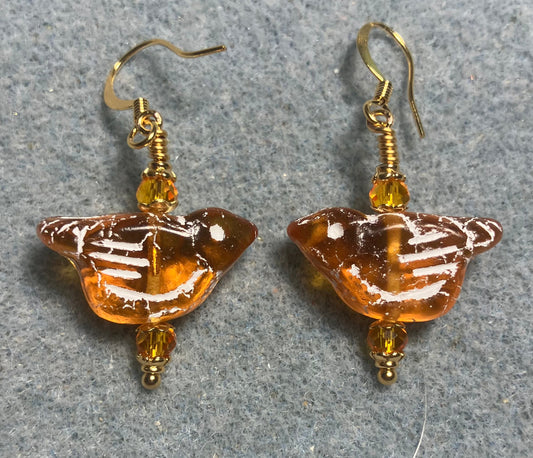 Amber (with white inlay) Czech glass bird bead earrings adorned with amber Chinese crystal beads.